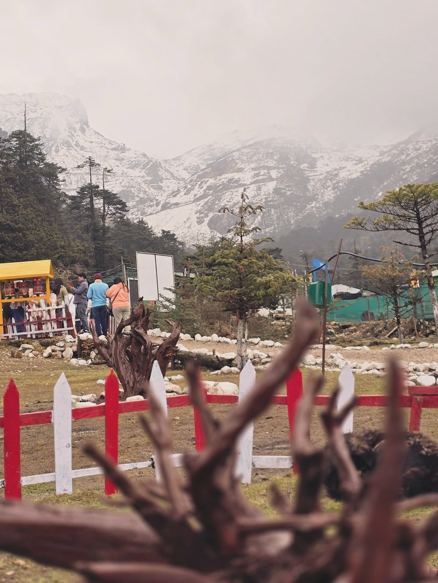 Madhuri Lake with snow mountains, Tawang