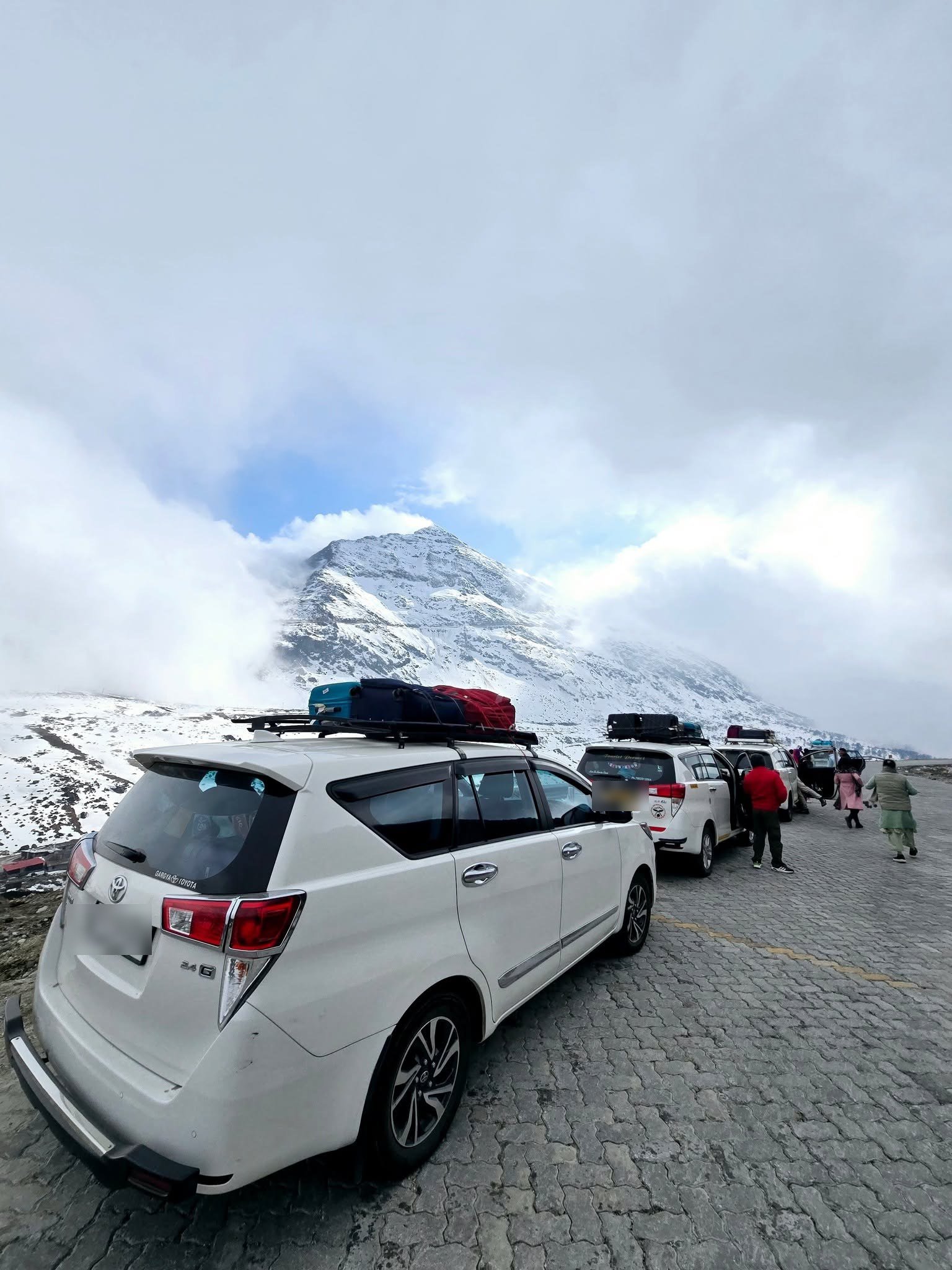 Innova Crysta in deep snow at Sela Pass on the Tawang route
